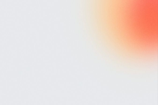 Gradient background transitioning from light gray to orange